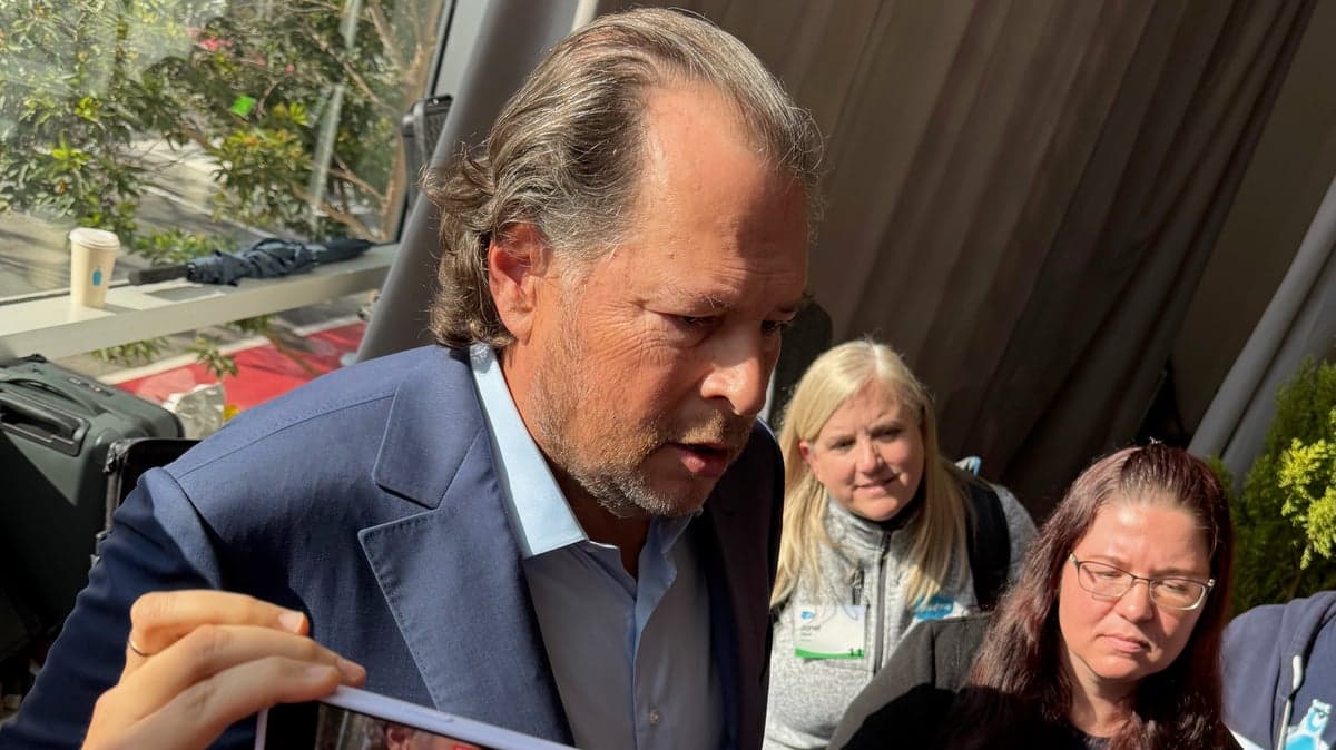 Salesforce CEO engaging with attendees at a live event, showcasing leadership and innovation in the AI-driven enterprise software industry